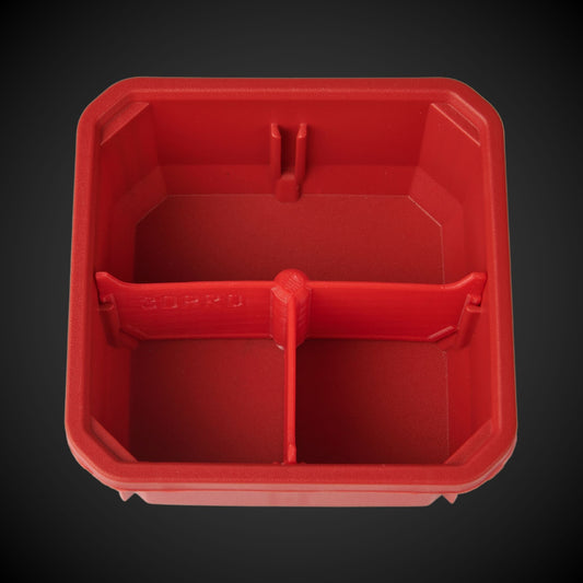 A red, 3-way low single bin divider with black details, designed to fit into a Milwaukee Packout low organiser single bin.