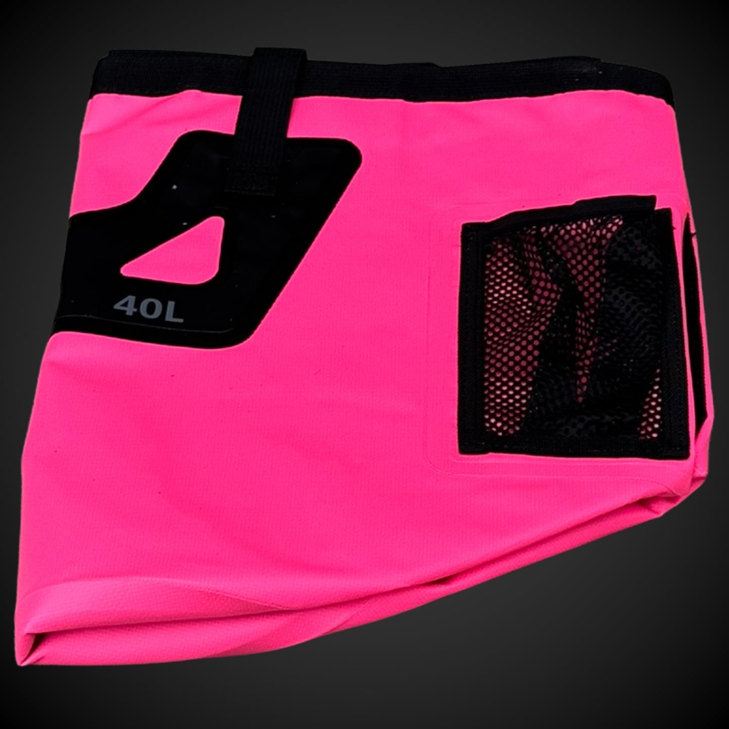Folded Limited Edition Pink Bucket mesh pocket on a black background