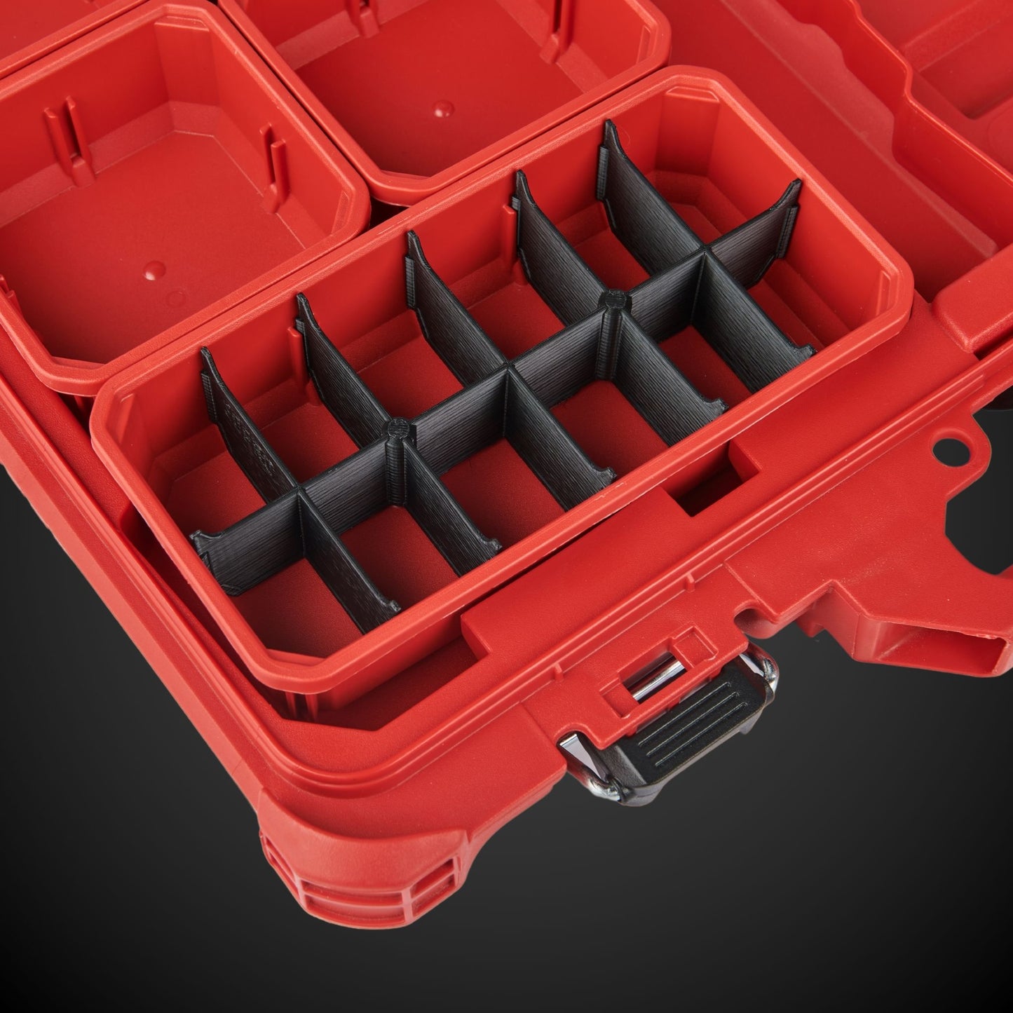 Red tool box with black 12-Way Low Double Bin Divider on a dark background