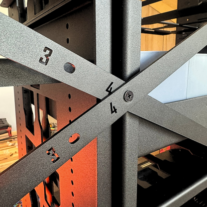 Close-up of a metal frame structure with numbered bars