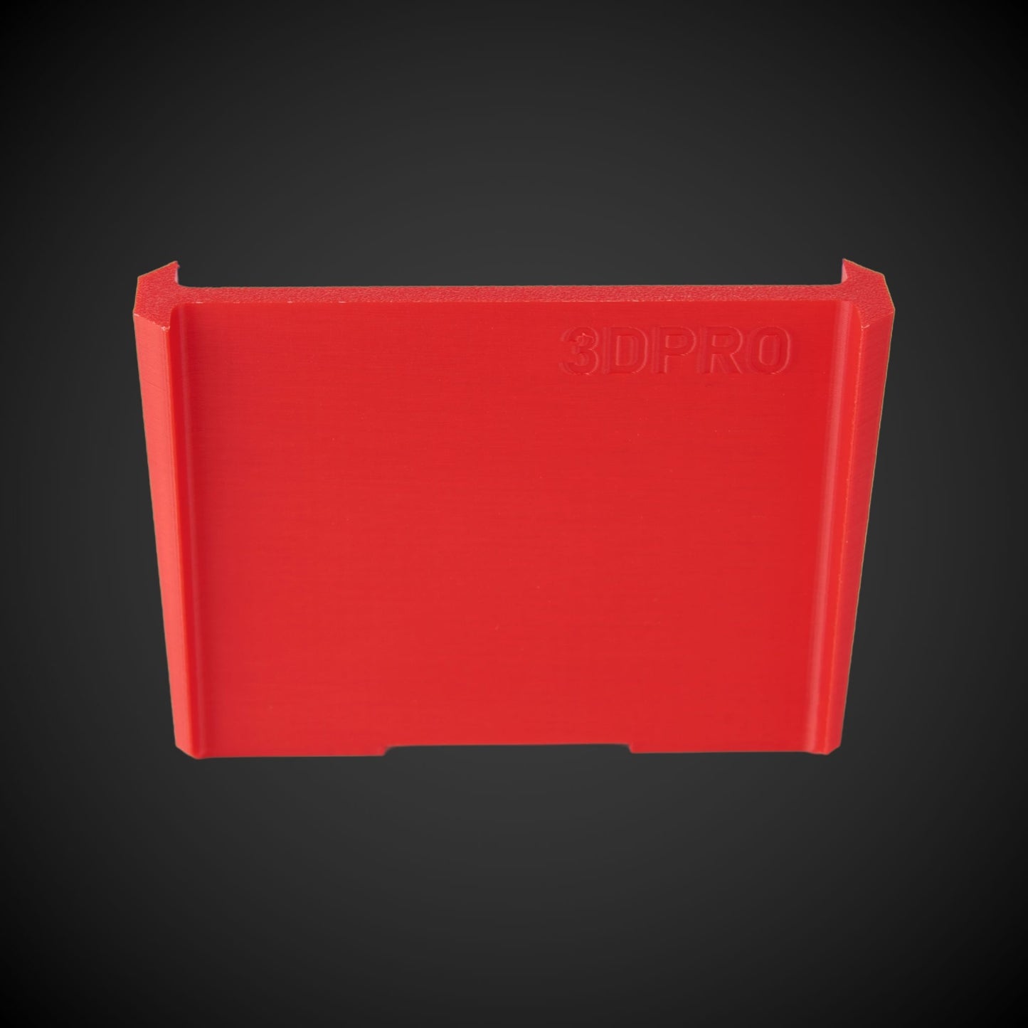 Red plastic component with '3DPRO' branding on a black background