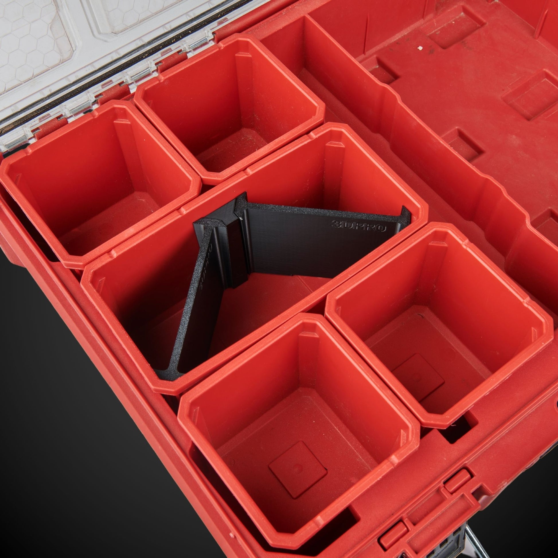 Red tool box with 3-Way Standard Double Bin Divider (MP) on a black background