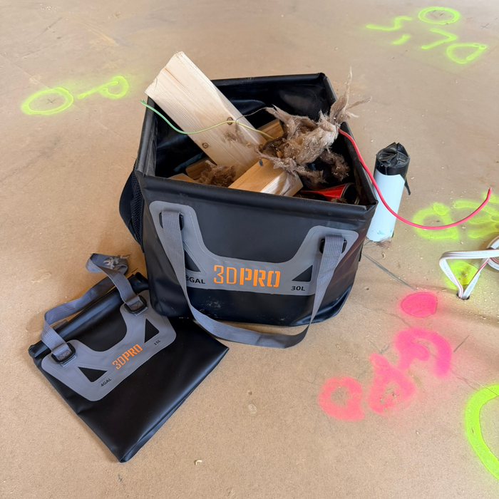 30L/8GAL Pro Square Folding Bucket with contents on a cardboard surface