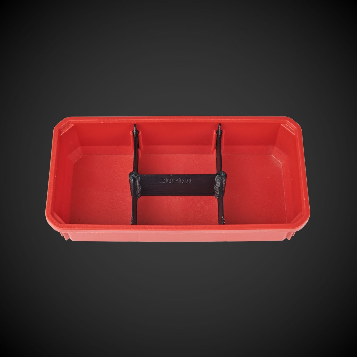 A red 4-way low double bin divider with black accents, designed for organizing tools within a bin.