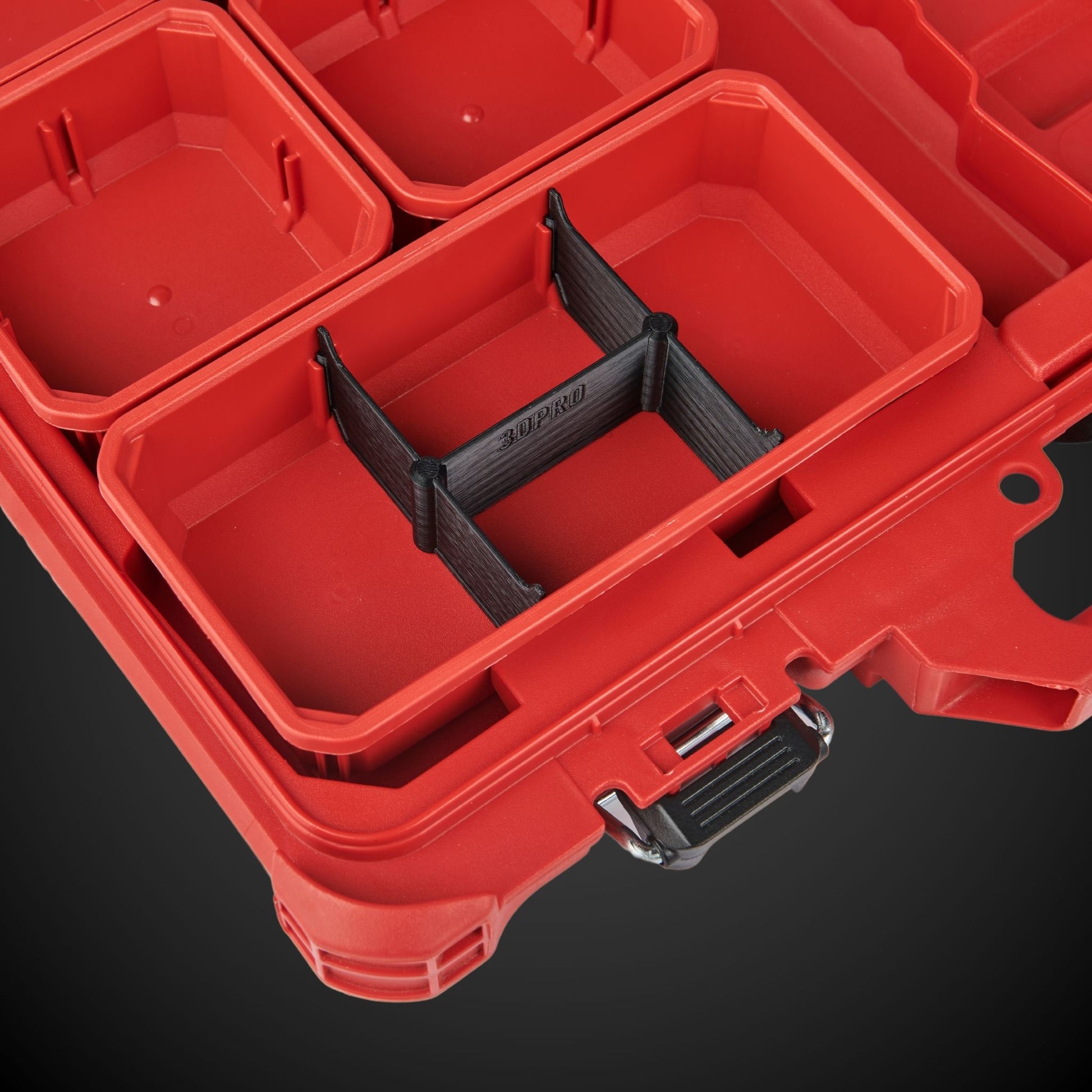 Red tool box with 4-Way Low Double Bin Divider (MP)on a black background