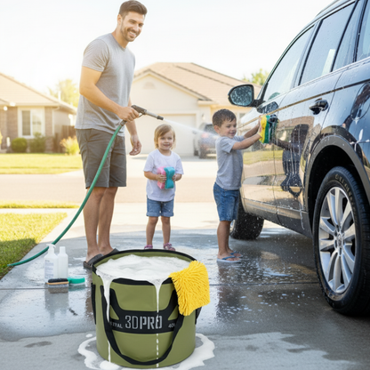 Man and two children washing a car with a green bucket labeled '3DPro' on a driveway.