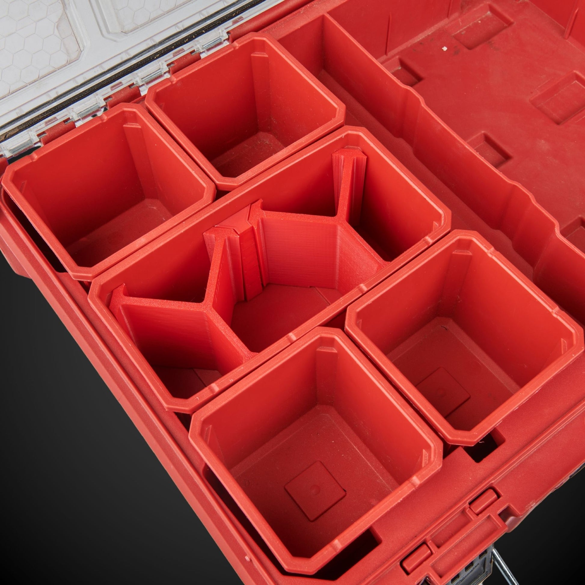 Red 5-Way Standard Double Bin Divider (MP) inside an open toolbox on a black background
