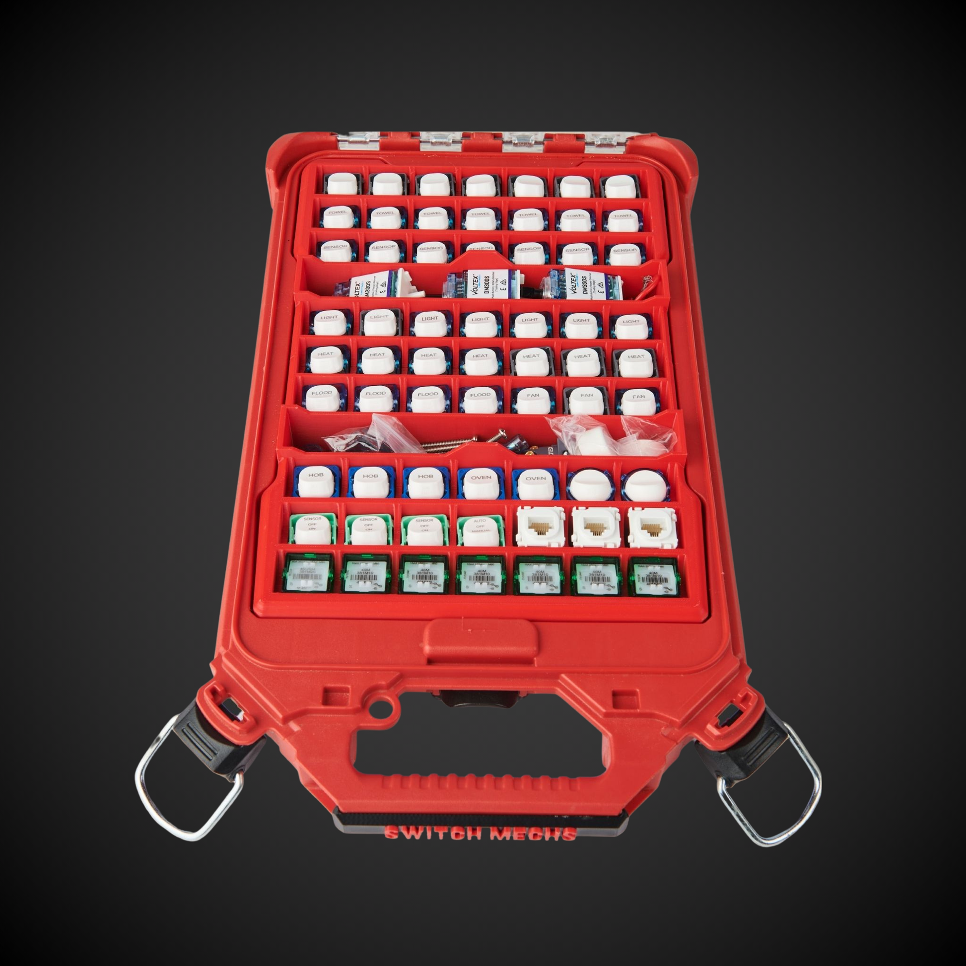 Red tool case with various components on a dark background