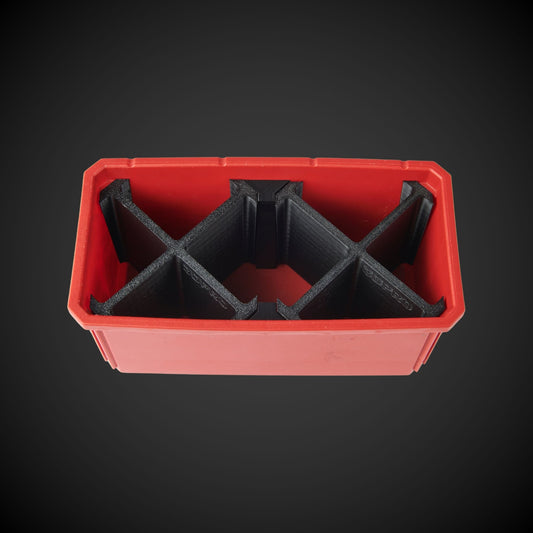 A black 7-way double bin divider inside a red tool storage bin, designed to organize and separate items within the bin.