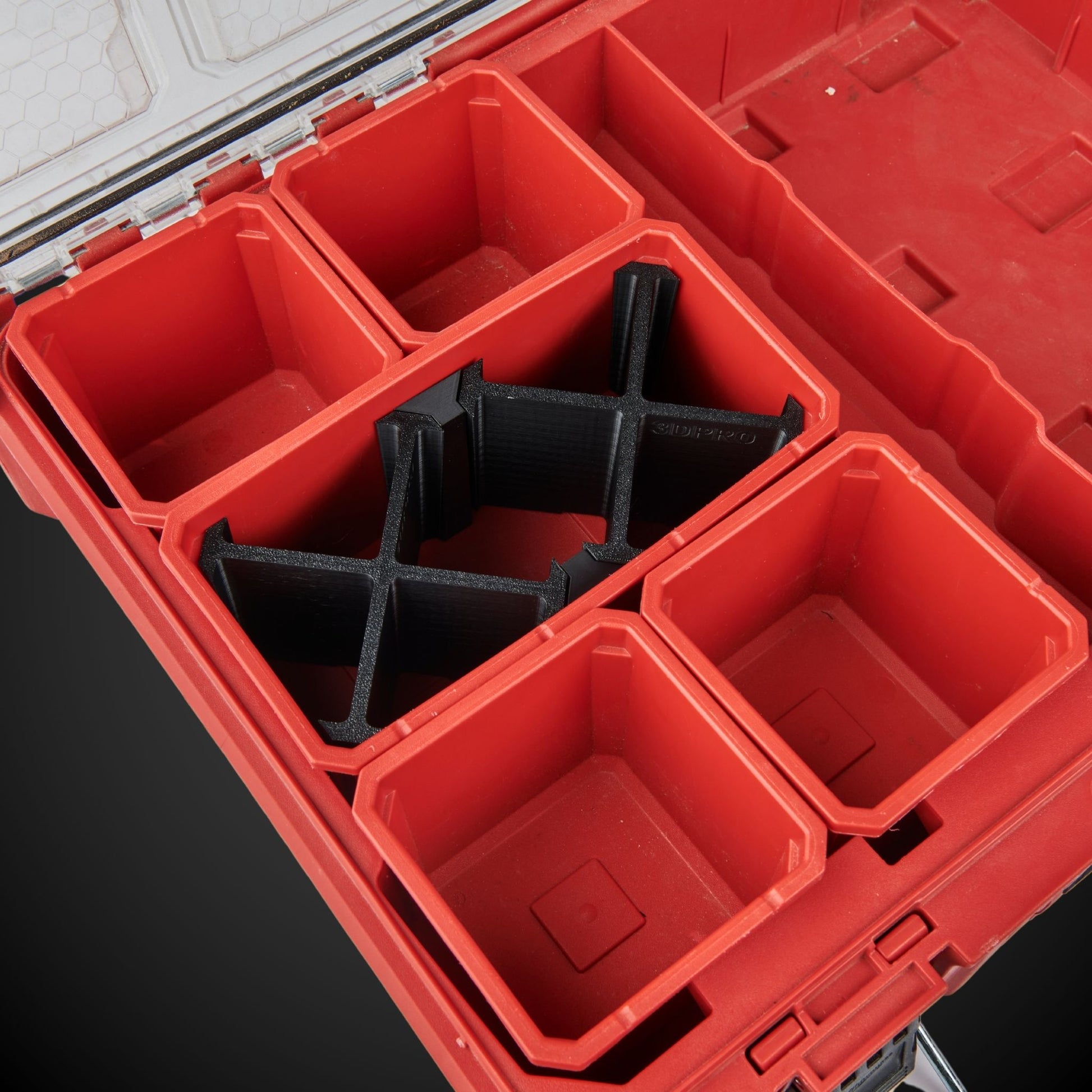 Red Milwaukee tool box with 7-Way Standard Double Bin Divider (MP) on a black background