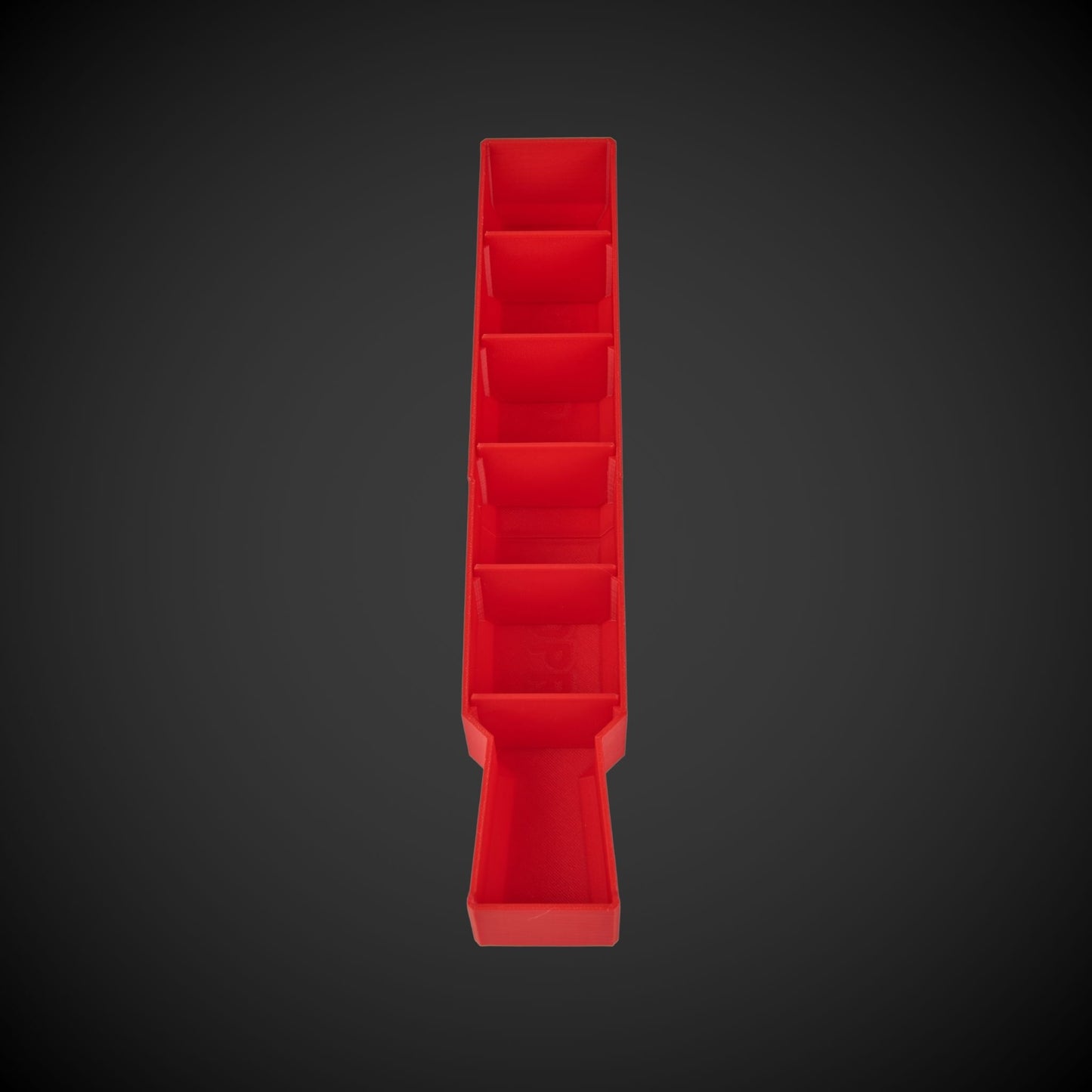 A red set of Milwaukee Slim Packout Centre bin dividers displayed in a vertical arrangement against a black background.