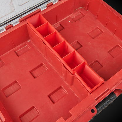 Red tool organizer withCentre Divider Pack (Standard Full Width Packout) on a black background
