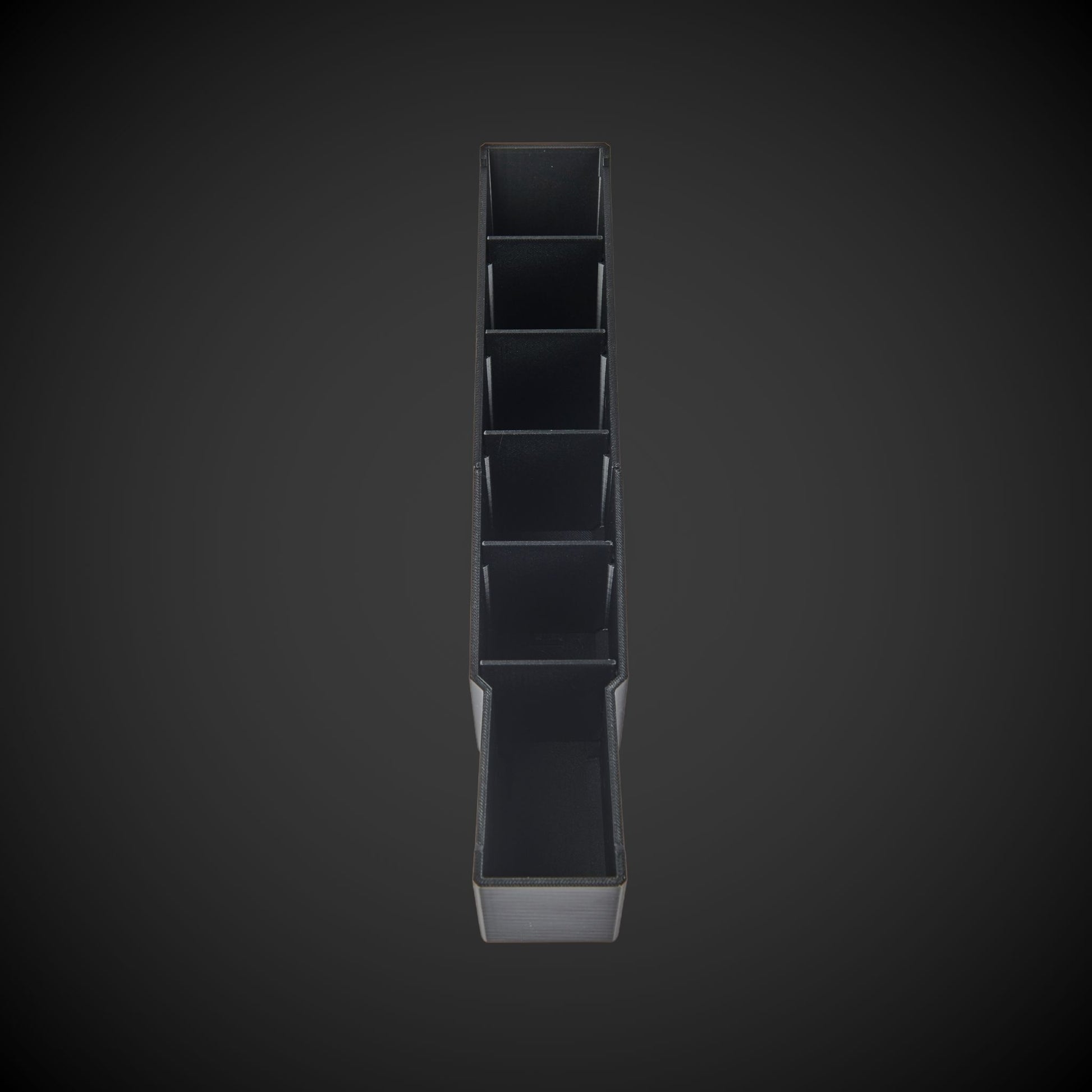 Black Centre Divider Pack (Standard Full Width Packout) with five square compartments on a dark gray background