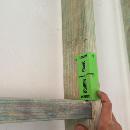 Green Nog Pro - Noggin SetBacks on a wooden plank against a white wall