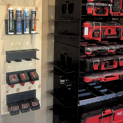 Tool storage system with shelves and toolboxes in a workshop setting