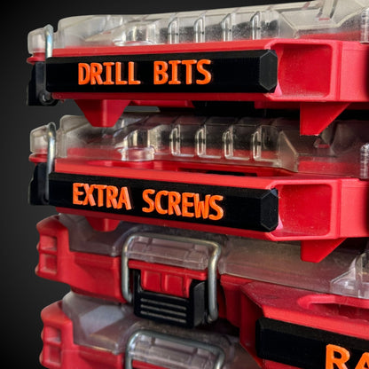 Stack of red Milwaukee packouts with snap on labels 