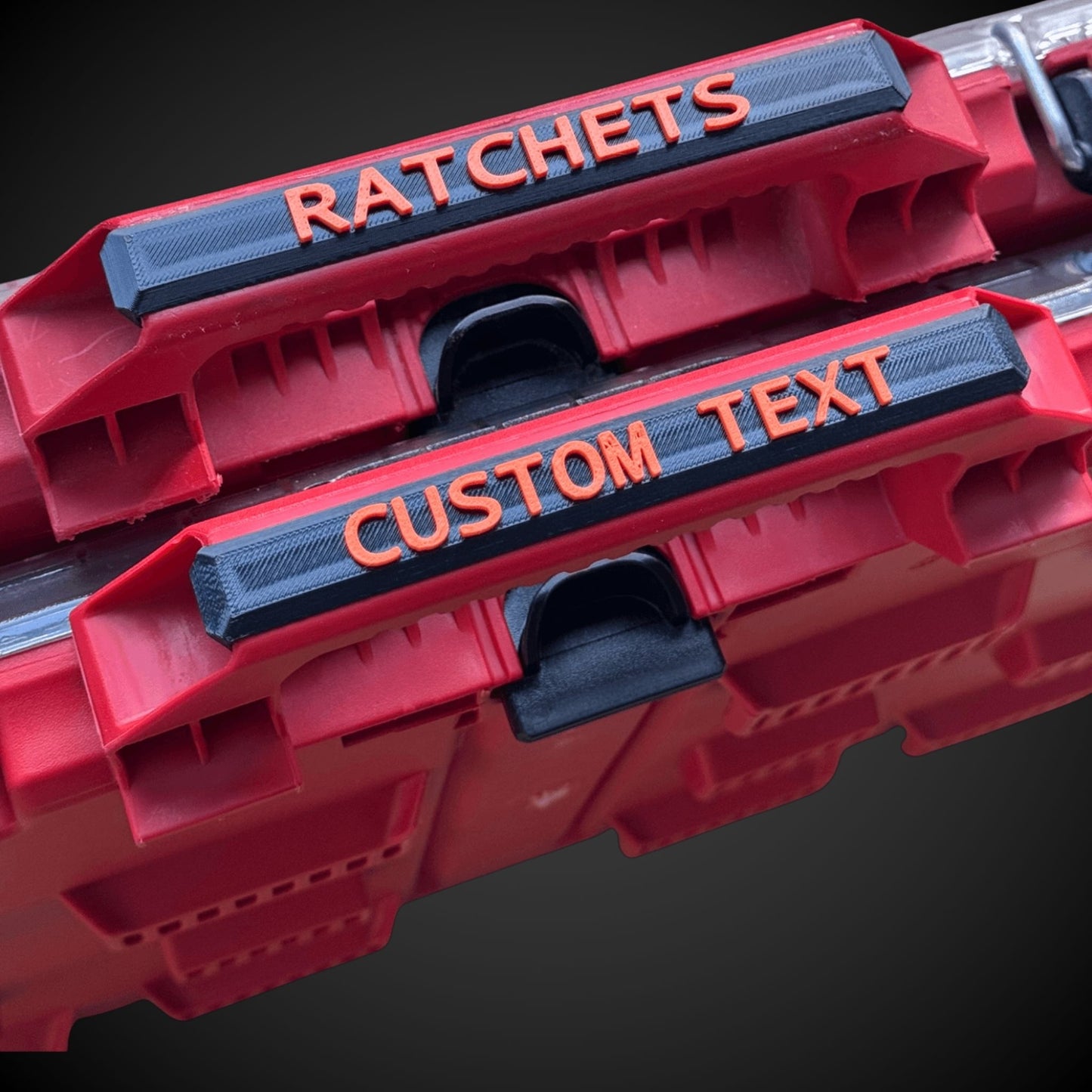 Milkwaukee packout with 'Ratchets' and 'Custom Text' labels on a dark background