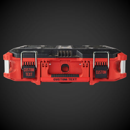 Red and black tool organizer with customizable text on a dark background