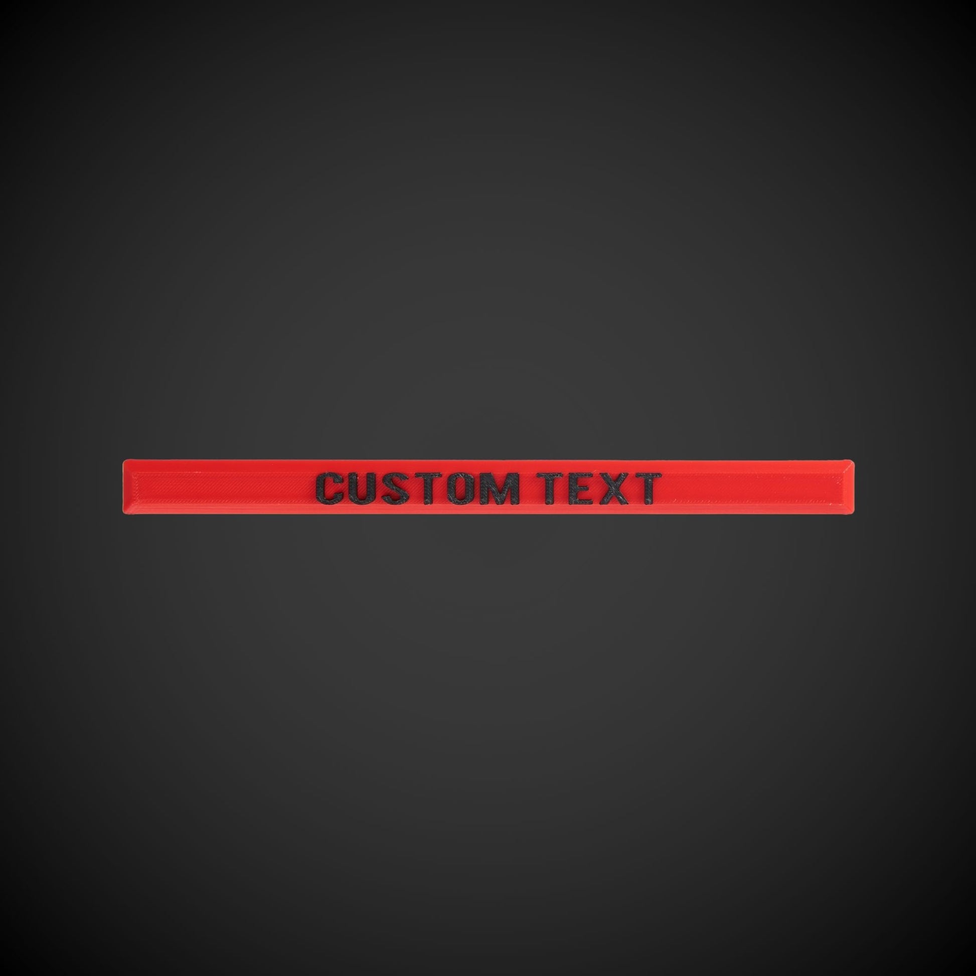 A red and black custom label with text space for personalization, designed for extra wide handles.