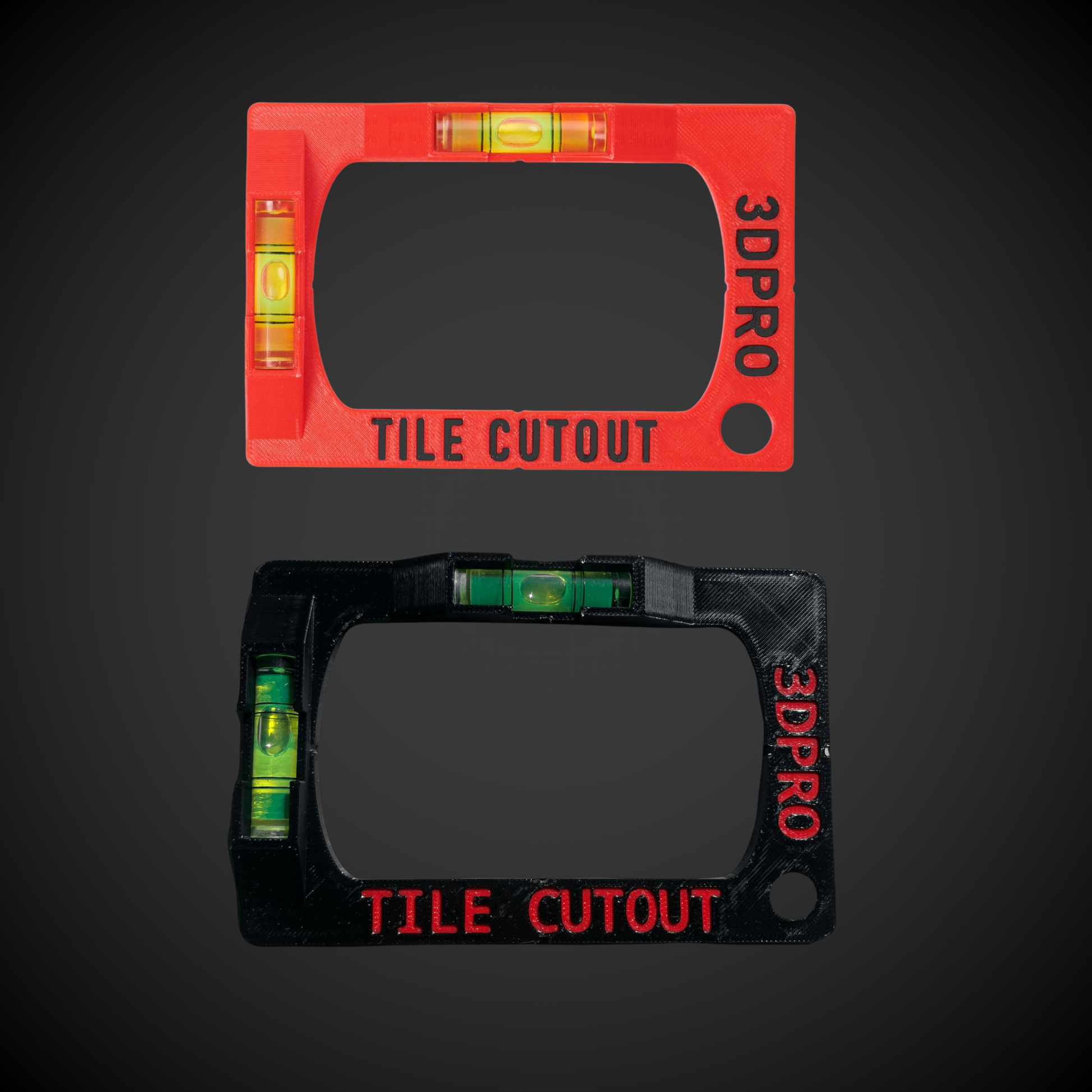 Black and red tile cutout tools with level indicators on a dark background