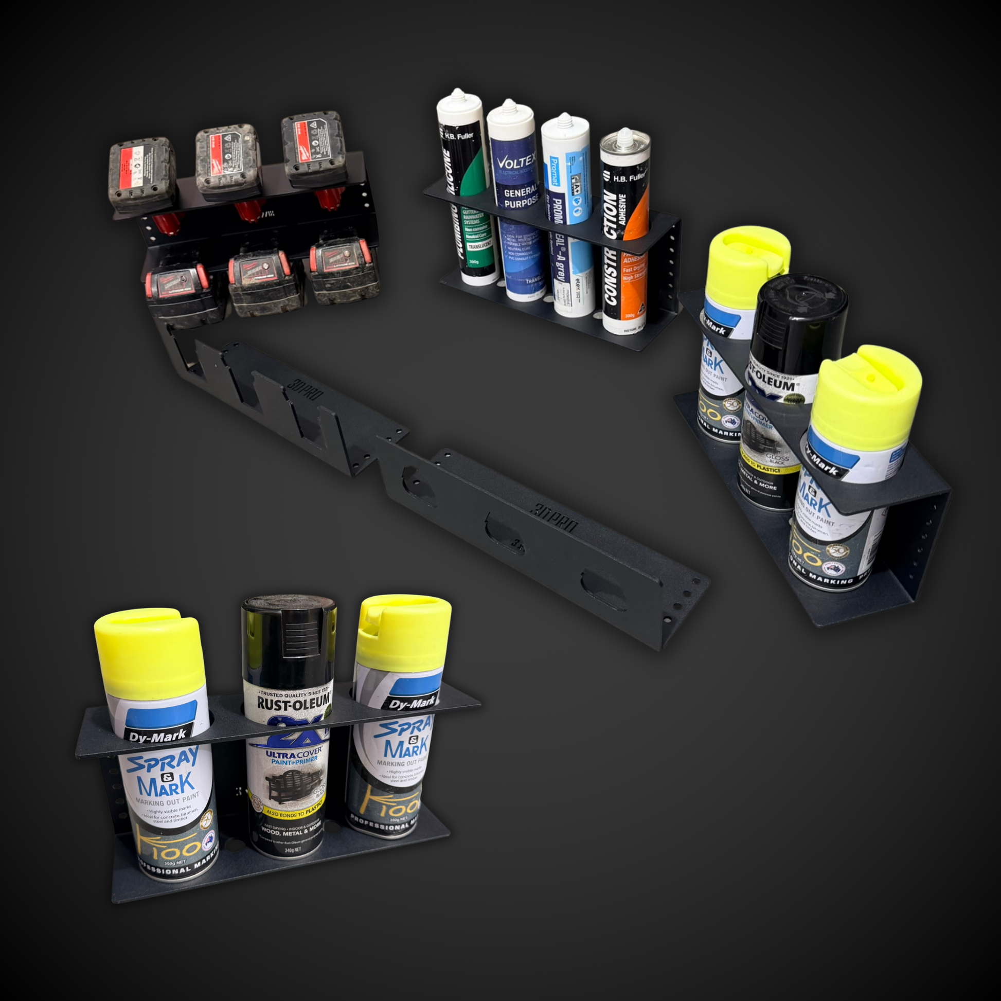Collection of automotive paint spray cans and tools on a black background