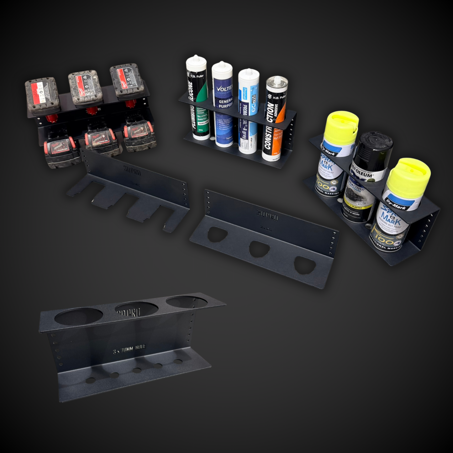 Collection of spray cans and tools on a dark background
